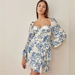 Reformation Cammi long-sleeve wrap minidress
Corsica blue white floral size 12
